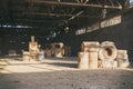 Abandoned factory hangar, where games are held in paintball Royalty Free Stock Photo