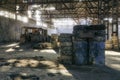 Abandoned factory hangar, where games are held in paintball Royalty Free Stock Photo