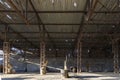 Abandoned factory hangar, where games are held in paintball Royalty Free Stock Photo