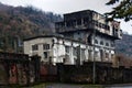 Abandoned factory in mountains.