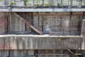 Abandoned factory stairs, walkways, ruins, broken and stained walls