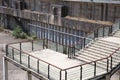 Abandoned factory stairs, walkways, ruins, broken and stained walls