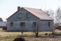 Abandoned farm house with blue roof in the countryside Royalty Free Stock Photo