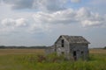 Abandoned Farm House with clouds on Minnesota Prairie Royalty Free Stock Photo