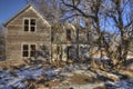 An Abandoned Farm House decays forgotten in rural South Dakota