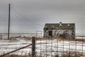 An Abandoned Farm House decays forgotten in rural South Dakota