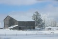 Abandoned farm house in a winter landscape photo