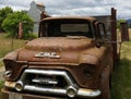 Abandoned Farm Truck Against Grain Elevator