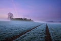 Abandoned farmhouse at dawn