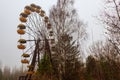 Abandoned Ferris Wheel in amusement park of ghost town Pripyat in Chernobyl Exclusion Zone, Ukraine Royalty Free Stock Photo