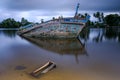 Abandoned fishing boat sink in water