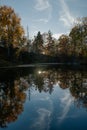 Abandoned flooded quarry with the reflection of the sun