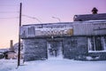 Abandoned food store with the label in russian language. Teriberka settlement, Murmansk Region, Russia