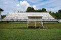 Abandoned football stadium and field with nobody