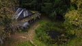 Abandoned forester's house in a deep forest. Autumn forest landscape. An aging abandoned house. Royalty Free Stock Photo