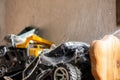 Abandoned and forgotten old toys covered with spider web stored at backyard. Grow up of child. Childhood end concept Royalty Free Stock Photo