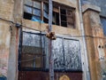 Abandoned and forsaken apartment building in a poor area of town Royalty Free Stock Photo