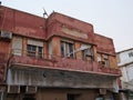 Abandoned and forsaken apartment building in a poor area of town Royalty Free Stock Photo