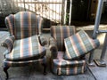 Abandoned furniture on city sidewalk Royalty Free Stock Photo