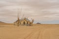 The abandoned Garub Railway Station with a daed tree near Kolmanskop Royalty Free Stock Photo