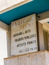 Abandoned ghost town of Varosha (Famagusta) in Northern Cyprus - Faded shop sign