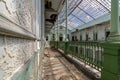 Abandoned girls high school, lycee V in Belgium. Long hallway with beautiful decay.