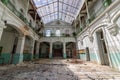 Abandoned girls high school, lycee V in Belgium. Sunlight shines through the roof.