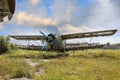 Abandoned green small propeller plane. Airplane graveyard Royalty Free Stock Photo