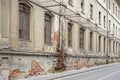 Abandoned grunge building with with boarded up windows