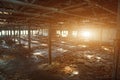 Abandoned, haunted and ruined industrial warehouse or factory building inside, large hall with perspective Royalty Free Stock Photo