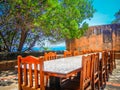 Abandoned hidden prison with chairs and table in zanzibar