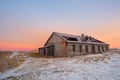 Abandoned house against the Arctic sky. Old authentic village of Teriberka Royalty Free Stock Photo