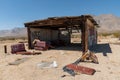 Abandoned houses and camper trailer in the middle of the desert Royalty Free Stock Photo