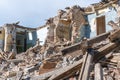 An abandoned house collapses. The house is destroyed. Cracks in wall of house. Destruction of old houses, earthquakes