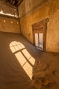 An abandoned house in the ghost town of Kolmanskop Royalty Free Stock Photo