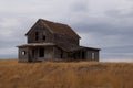 Abandoned House on a golden field Royalty Free Stock Photo