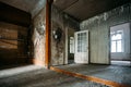 Abandoned house interior, dirty room, rotten walls