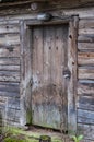 Locked old-fashioned entrance door to rural wooden house Royalty Free Stock Photo