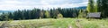 Abandoned house in mountains. Wide panorama Royalty Free Stock Photo