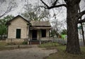 Abandoned house with sagging porch