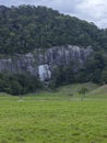 Abandoned house and stone mountain. Royalty Free Stock Photo