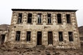 Abandoned house with stucco architraves Royalty Free Stock Photo