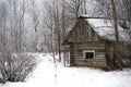 Old house in the snow-covered winter forest Royalty Free Stock Photo