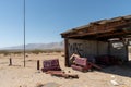 Abandoned houses and camper trailer in the middle of the desert Royalty Free Stock Photo