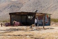 Abandoned houses and camper trailer in the middle of the desert Royalty Free Stock Photo