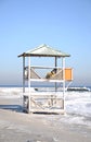 Abandoned, icy rescue station. Beach tower Royalty Free Stock Photo