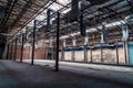 The abandoned industrial building. Fantasy interior scene Royalty Free Stock Photo