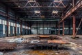 Abandoned industrial building with old rusty bridge crane and metal constructions Royalty Free Stock Photo