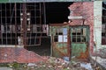 Abandoned Industrial Building with Rusting Green Door in Warsaw, Indiana