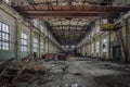 Abandoned industrial building with rusty bridge crane